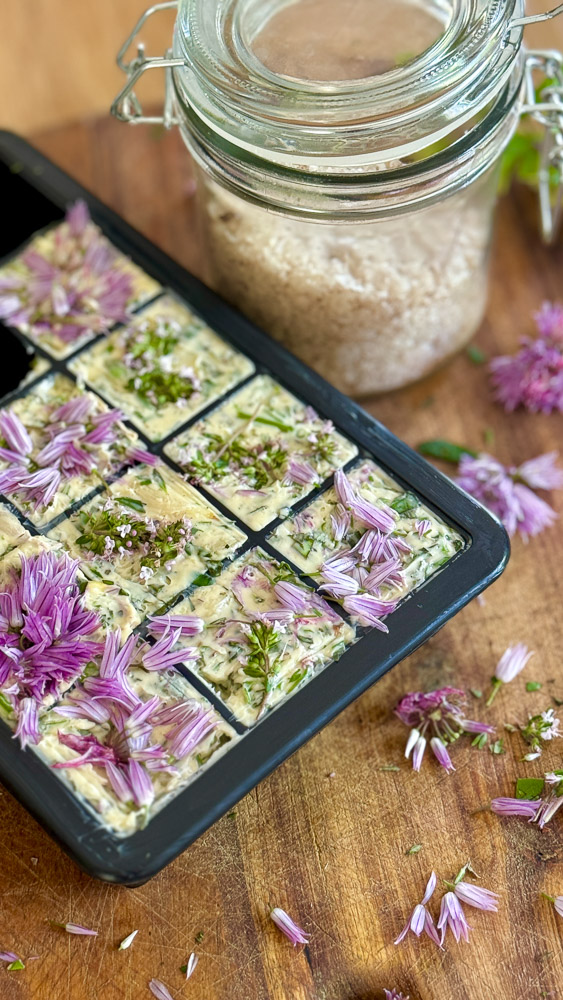 a tray of food with flowers on it